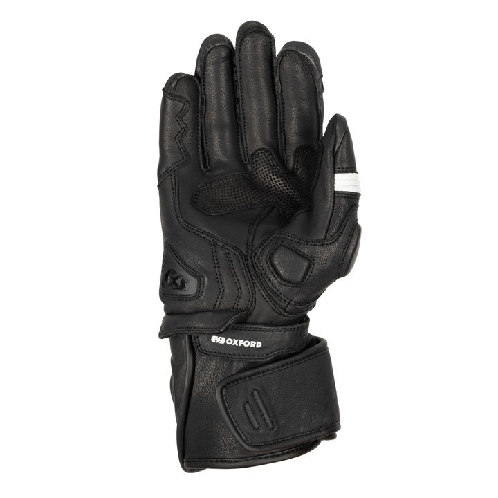 Motorcycle glove from Oxford in black leather showcasing reinforced areas and a wrist strap against a white background.