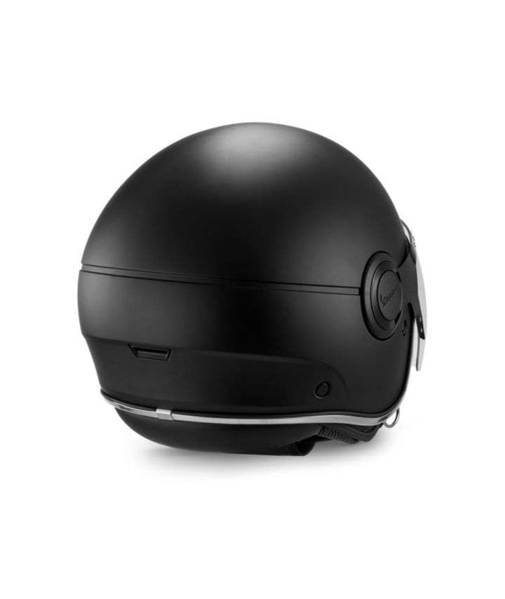 A matte black motorcycle helmet isolated on a white background.