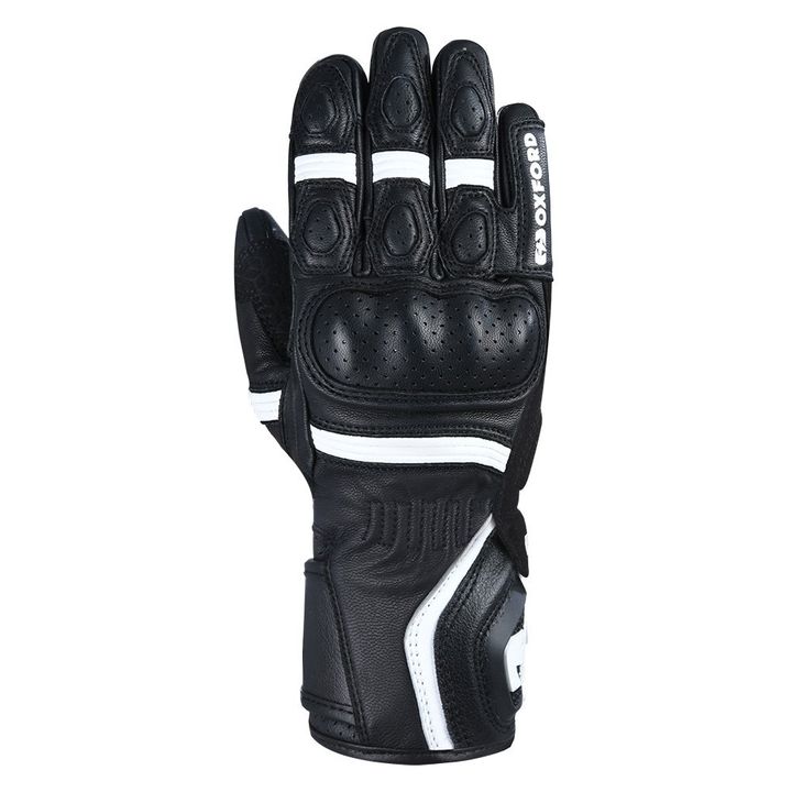 A black motorcycle glove with white accents and reinforced knuckle protection.