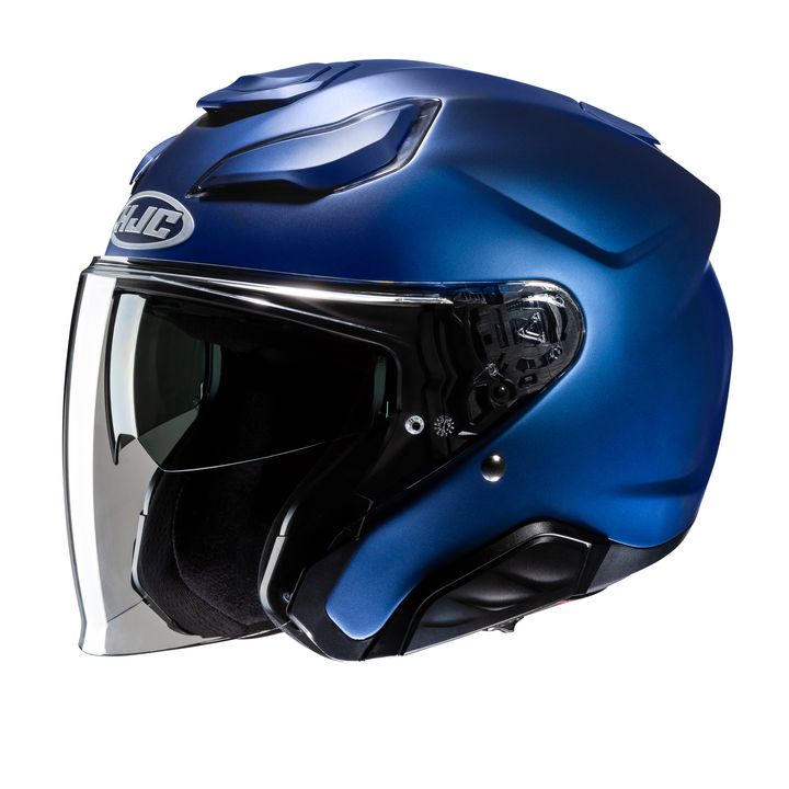 A blue motorcycle helmet with a visor and ventilation ridges on a white background.