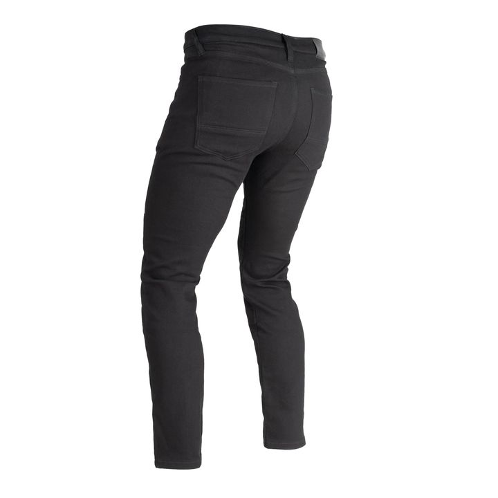 Alt text: Black jeans isolated on a white background with a focus on the back pockets and waistband.