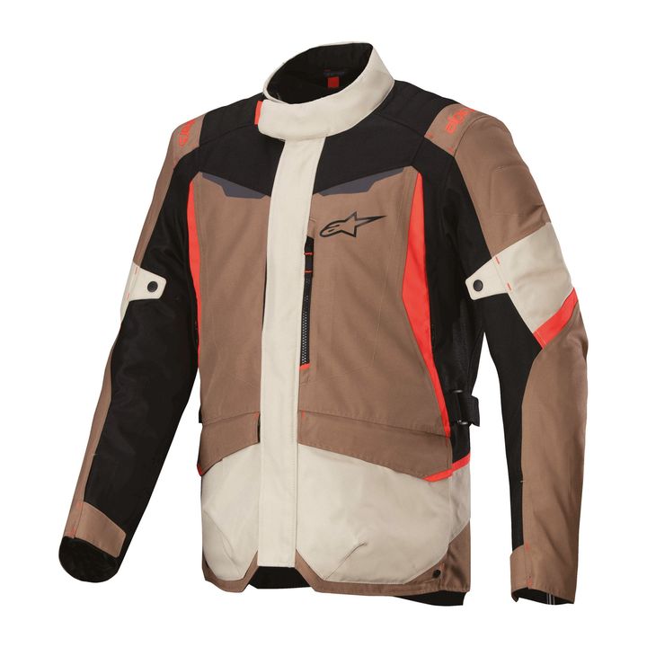 A motorcycle jacket with a combination of black, grey, and red accents, featuring protective padding and the manufacturer's logo on the chest.