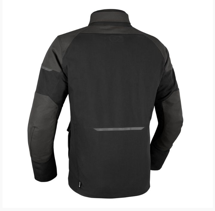 A rear view of a black tactical jacket with contrasting fabric panels on the shoulders and sleeves, a reflective horizontal stripe on the lower back, and a small logo at the upper back.