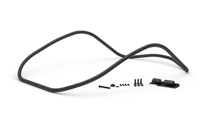 A disassembled black glasses frame lying next to screws and a clip on a white background.