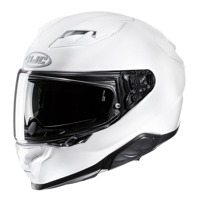 A white full-face motorcycle helmet with a closed black visor on a white background.