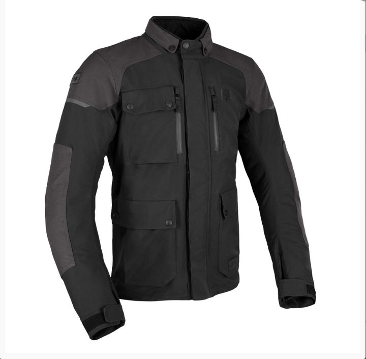 Oxford Barkston D2D Mens Jacket A black motorcycle jacket with reinforced elbow patches, multiple pockets, and a zip-up front, displayed on a plain background.