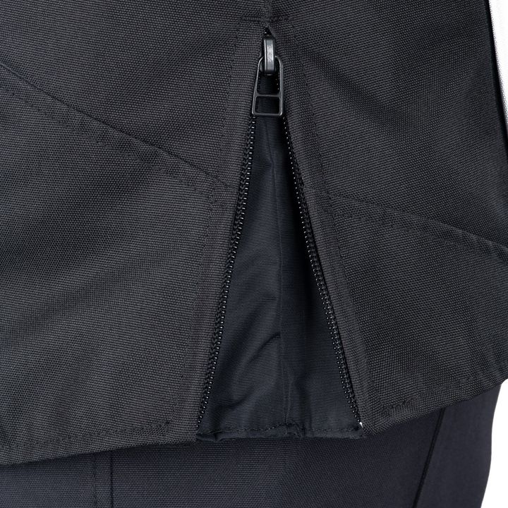 Close-up of a black jacket with a partially unzipped zipper.