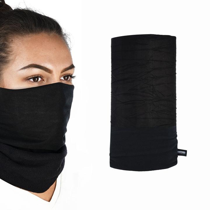 Oxford Snug Black A split image showing a woman wearing a black neck gaiter covering her nose and mouth on the left, and an isolated view of a black neck gaiter on the right, against a white background.