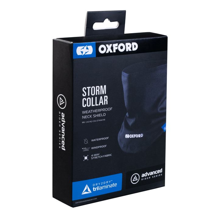 Alt text: Packaging for an Oxford Storm Collar weatherproof neck shield, highlighting features such as waterproof, windproof, and 4-way stretch fabric from the Advanced Rider Series. The packaging is black with blue text and graphics, including the #OXFORD hashtag and Dry2Dry trilaminate technology branding.