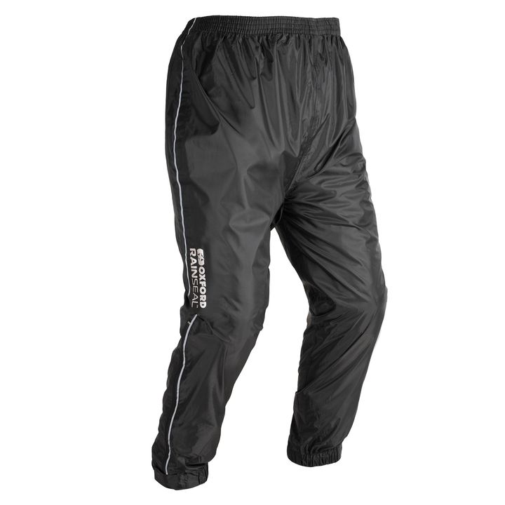 Oxford Rainseal Trousers Black athletic track pants with white branding text on the side, featuring an elastic waistband and cuffs, displayed against a white background.