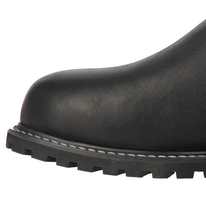 A close-up of the front part of a black leather shoe with a round toe and chunky treaded sole.