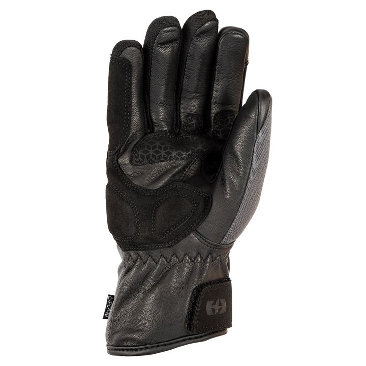 A black leather motorcycle glove isolated on a white background.