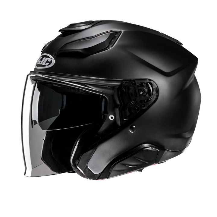 HJC F31 A matte black motorcycle helmet with a closed visor and aerodynamic design.